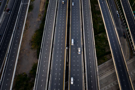 aerial view traffic car transportation freeway motorway and ring road at evening moving car long...