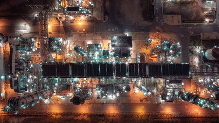 business and industrial area production plant or refinery crude oil and gas for transportatioon and export, aerial photography at night scene from drone,の写真素材