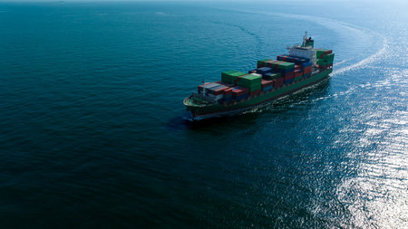 container cargo ship import export global business and industry commercial trade logistic and transportation of international by container cargo ship in the open sea, Container cargo freight shipping, front view drone shot,のeditorial素材
