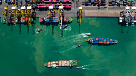 shipping commercial port loading and unloading cargo from container ship import and export by crane...