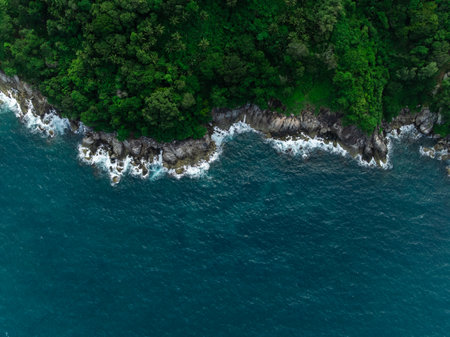 beautiful sea waves hiting rocks, aerial top view from drone.の写真素材