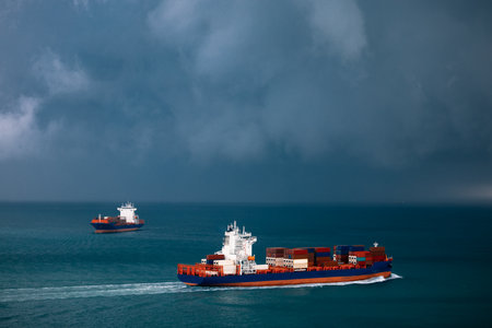 shipping container carrier container sailing in sea, global business and industry delivery service...