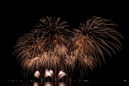 PATTAYA, CHONBURI, THAILAND, Real Fireworks at Pattaya bay, Pattaya national Fireworks Festival contest, November of every Year, Beautiful of bright light fireworks Show in middle sea, for postcard wallpaper background photo, conceptの写真素材