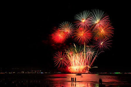 PATTAYA, THAILAND, Real Fireworks at Pattaya bay, Pattaya national Fireworks Festival contest, November of every Year, Beautiful of bright light fireworks Show for postcard, wallpaper, background, photo, web, page, magazine, social.の写真素材