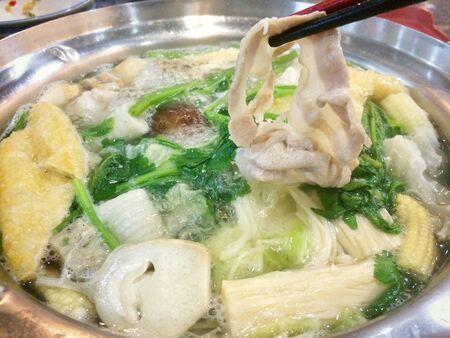 cooking on the hotpot many ingredient such as vegetableの写真素材