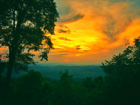 Last light of the day at the mountain Center for the study of the nature and ecotourism seven future - pong cubes pole, saraburi thailandの写真素材