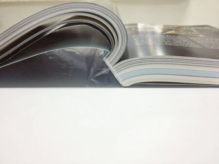 Read a book on table isolated.の写真素材