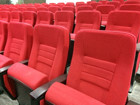 Empty red seats for cinema or theater and conference or concertの写真素材