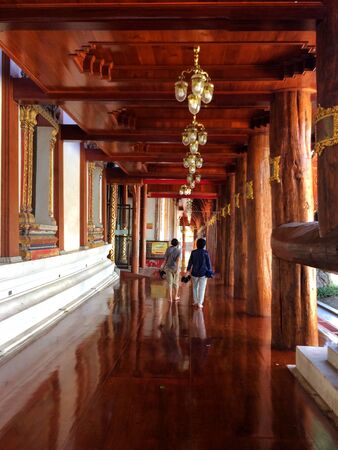AYUTTHAYA,THAILAND-NOVEMBER 24, 2018 : Visitors walk around the Wat Phanan Choeng temple.のeditorial素材