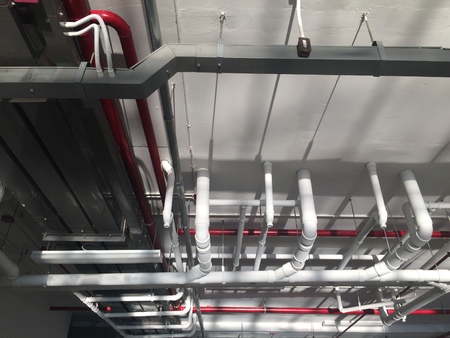 PVC Piping hanging underpass building inside the building.