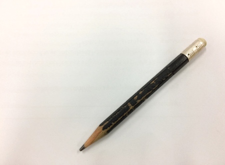 Black pencil isolated on white backgroundの写真素材