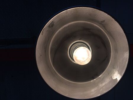 Bright light lamp on black background