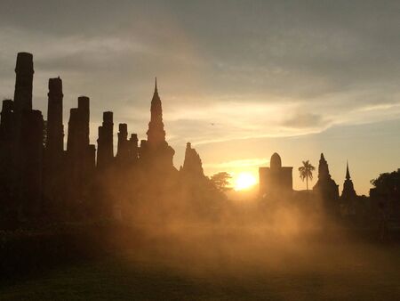 Sunset Last light of the day in sukhothai historical park.の写真素材