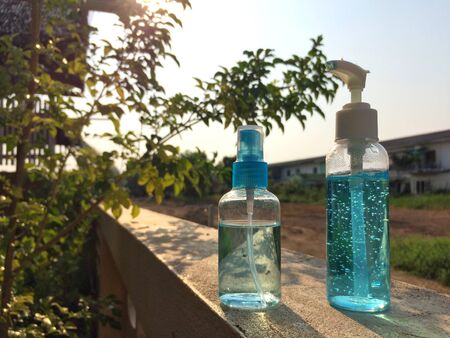 Alcohol and gel in bottles to be used for injection cleaning to protect against viruses COVID-19.の写真素材