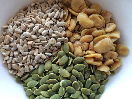 Close-up Healthy food, dried cereals, sunflower seeds, pumpkin seeds, pistachios.の写真素材