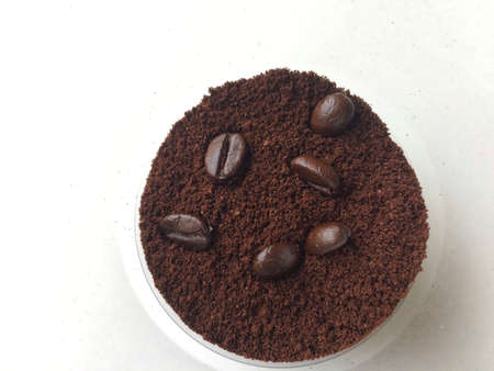 Coffee beans and ground powderの写真素材
