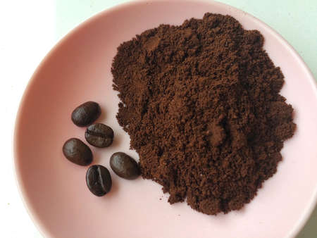 Coffee beans and ground powderの写真素材