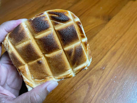 Toast with chilli paste and chicken sausageの写真素材