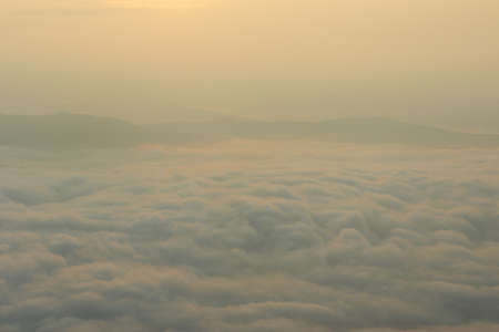 foggy landscape of mist at sunriseの写真素材
