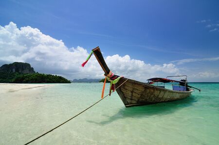 Boat on beautiful beach at Phi Phi island, Krabi, Thailandの写真素材