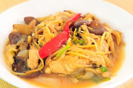 Chicken fried with ginger, Thai dish of chickenの写真素材