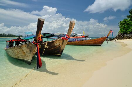 Boats on beautiful beach, Phi Phi island, Krabi, Thailandの写真素材