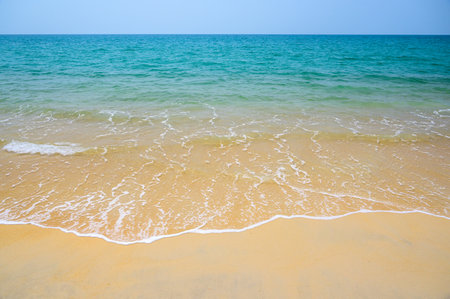 Wave on the sandy beach at Mai Khao Beach, Phuket, Thailandの写真素材