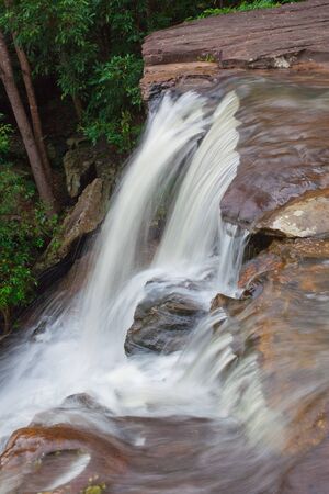 Waterfall is a natural attraction to beautiful forest park and a cool, clear river.の写真素材