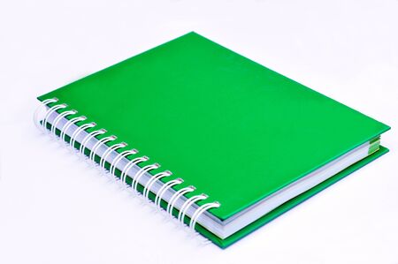 Isolated incline green note book の写真素材