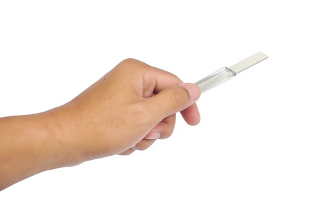 isolated hand holding cutting knife tool