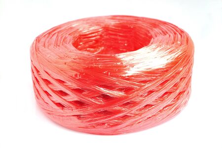 Red plastic rope isolated on white background