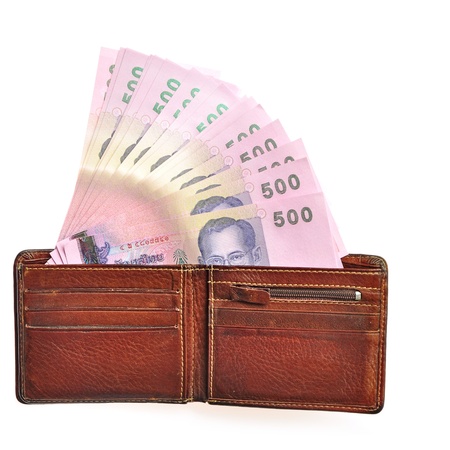 Thailand banknotes from wallet on white background