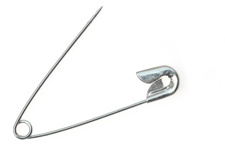 A regular safety pin on an isolated background