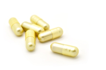 closeup of pills isolated on white background