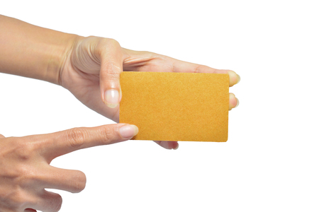 Hands hold business cards on white background with clipping path の写真素材