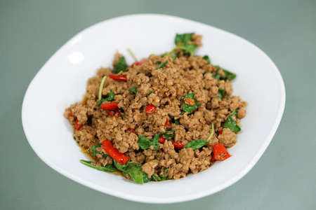 Stir-fried pork and basilの写真素材