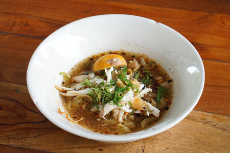 Spicy Tom Yum Noodle with Chickenの写真素材