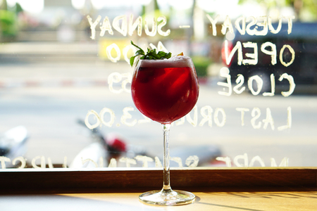 A Glass of Red Sangria, Homemade cocktail traditionally consists of red wine and chopped fruit, often with other ingredients such as cherry liqueur, Triple sec, Red Wine, Grapefruit juice and syrup.の写真素材