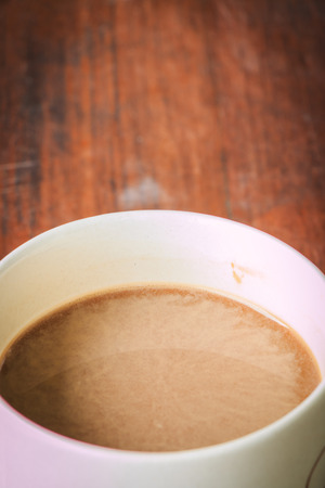 Coffee. Cup Of Coffee on brown deskの写真素材