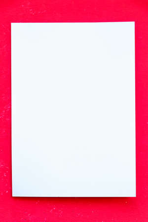 Blank Paper on red background.の写真素材