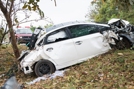 Accident car crash with tree on the roadのeditorial素材