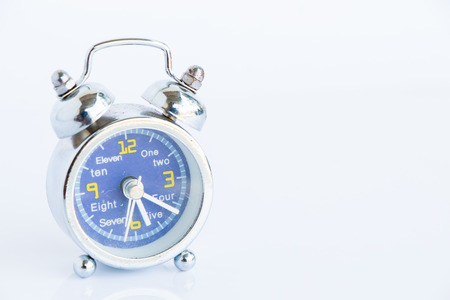 Alarm clock on white 