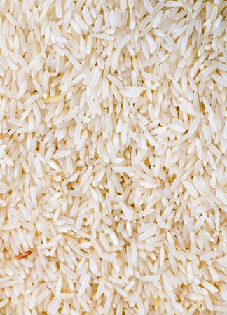 uncooked white rice background.の写真素材