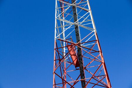 Close up cellular pillar with blue sky background.の写真素材
