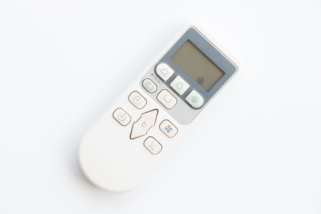 Air conditioner remote control on white background.の写真素材