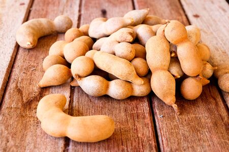 tamarind put on wooden backgroundの写真素材