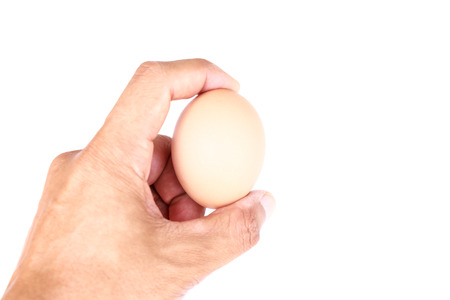 man holding egg with her hand isolated on white background