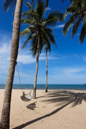 Hammock with sand on the beautiful beachの写真素材