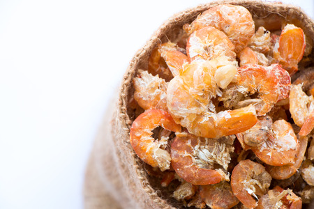 dried shrimp put on wooden spoon.の写真素材