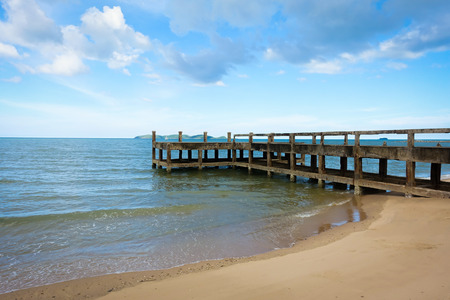 Concrete bridge to the sea with blue-sky